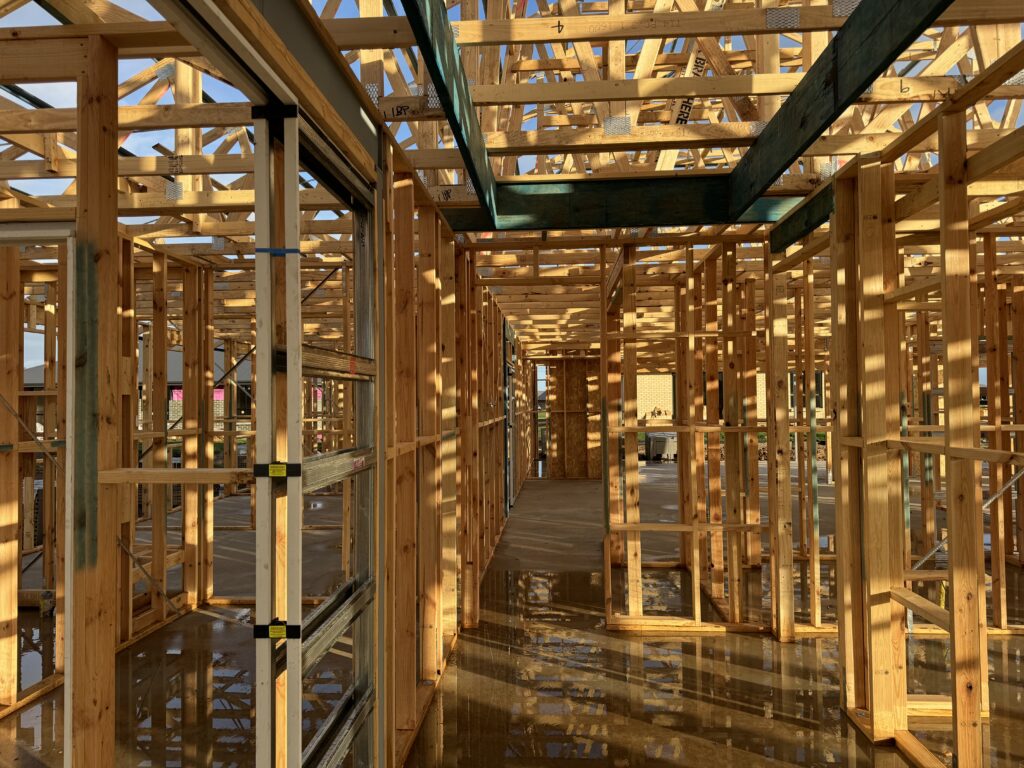 View of a house's interior during construction significant for civil or structural engineers.